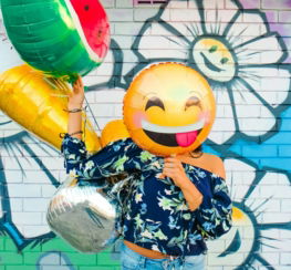 woman holding balloons